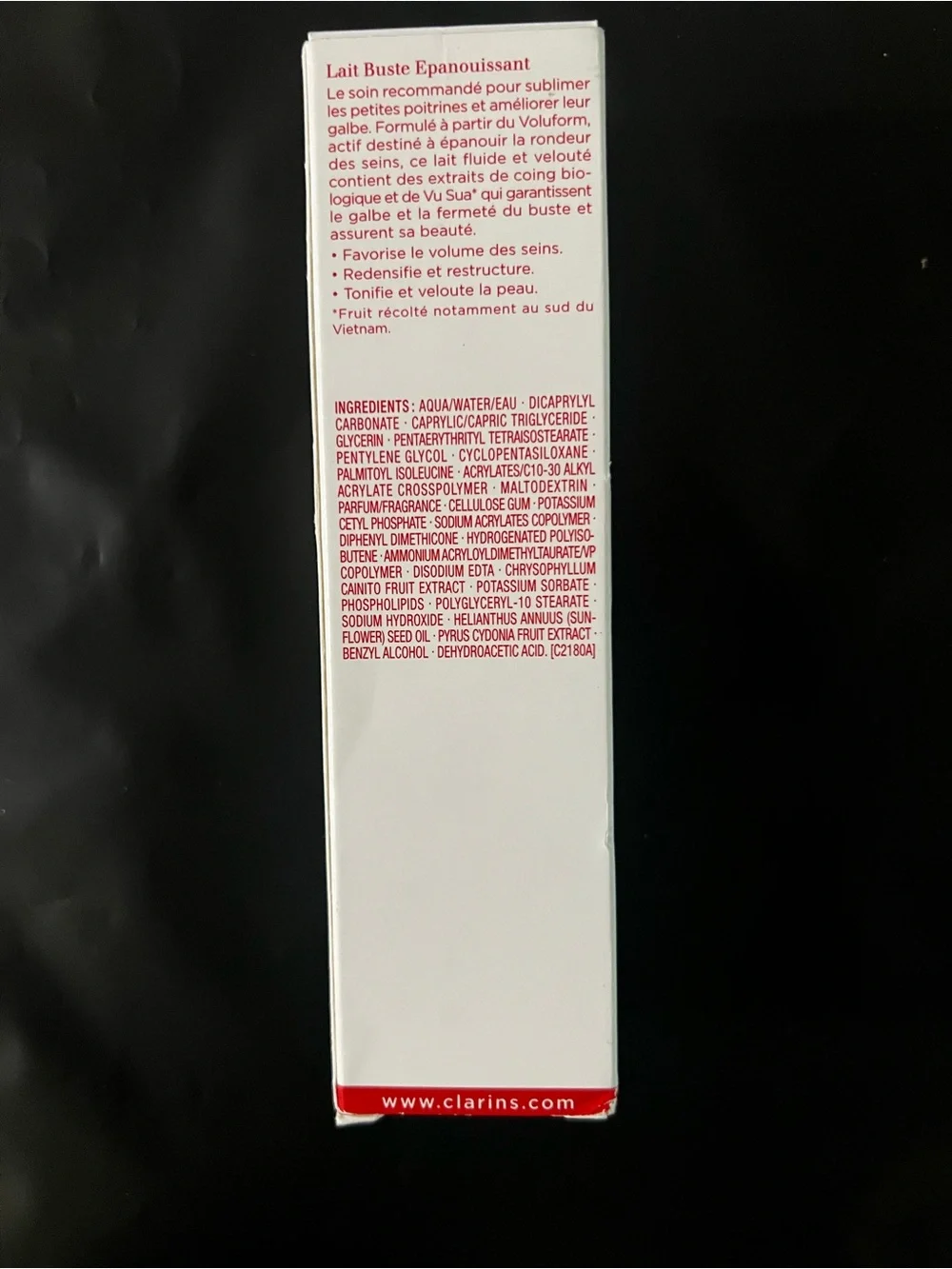 Clarins Bust Beauty Lotion — White with Red Text